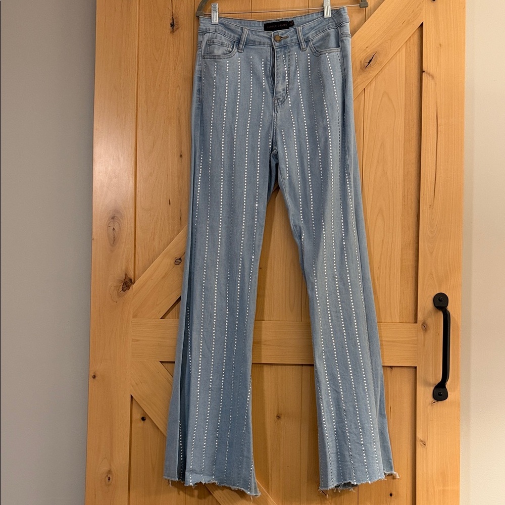 Stylish Light Blue Flare Jeans with Studded Accents